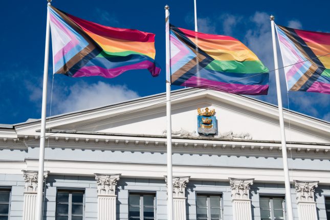 "Progress" pride flags flying outside Helsinki city hall.