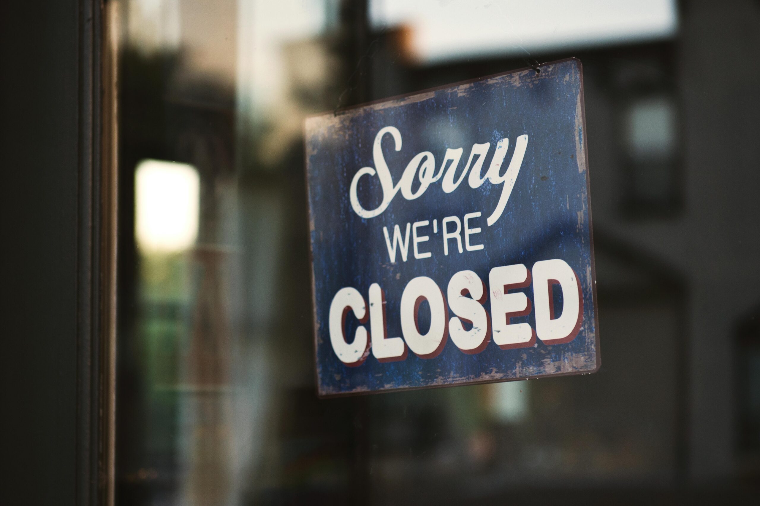 https://www.pexels.com/photo/blue-and-white-sorry-we-re-closed-wooden-signage-1171386/